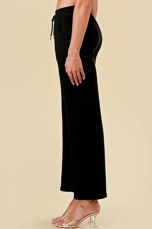 MID-RISE DRAWSTRING WIDE LEG PANTS WITH FUR LINING