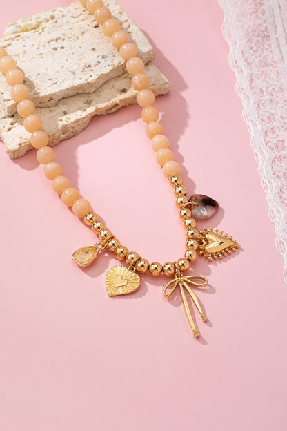 Beige Beaded Bow Heart Rhinestone Charm Necklace | 80N92689
