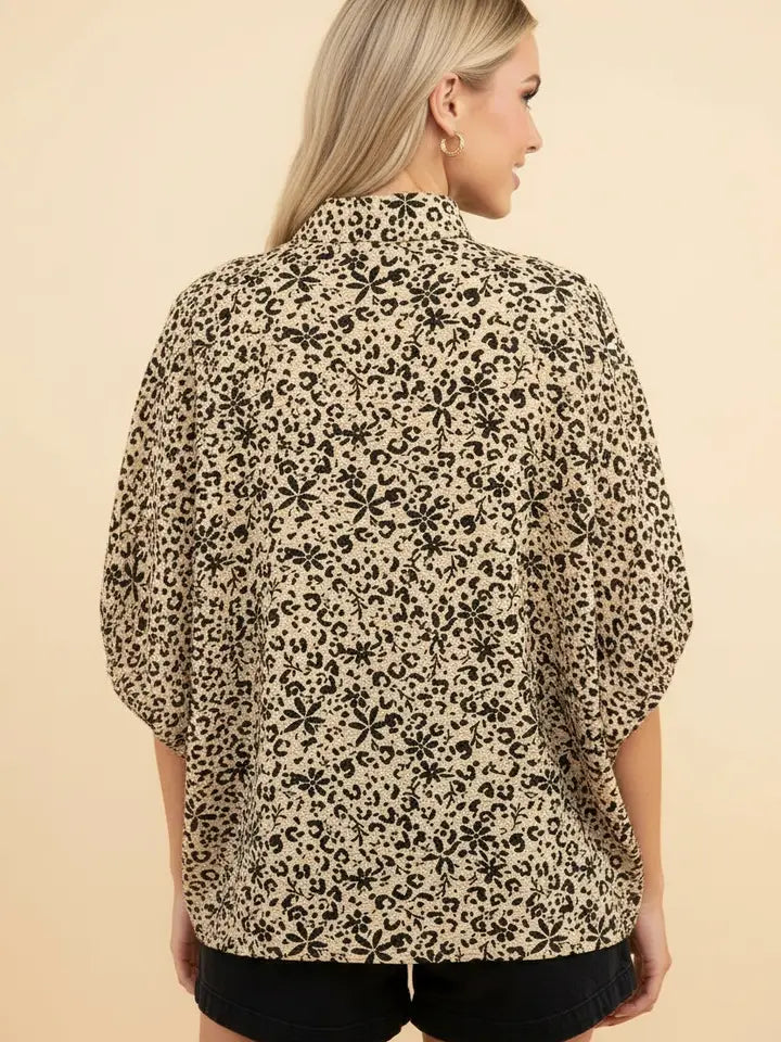 Animal Print V-Neck Blouse with Contrast Trim