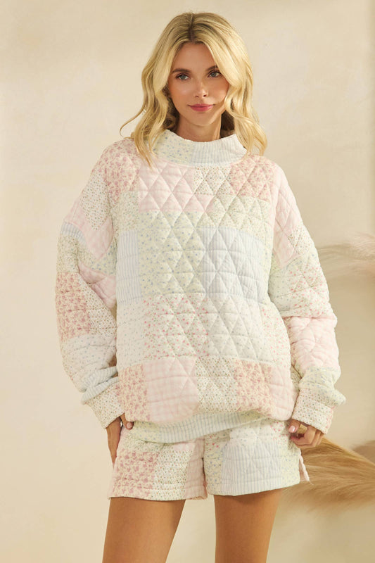 Floral textured mock neck sweater