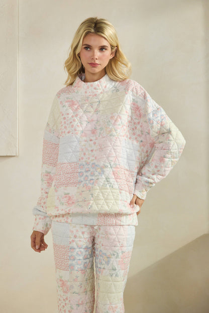 Floral textured mock neck sweater