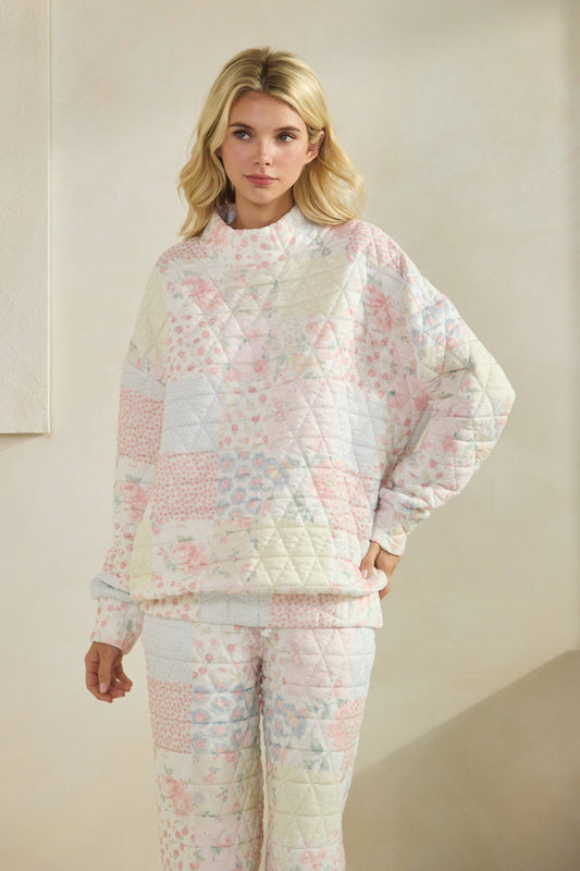 Floral textured mock neck sweater