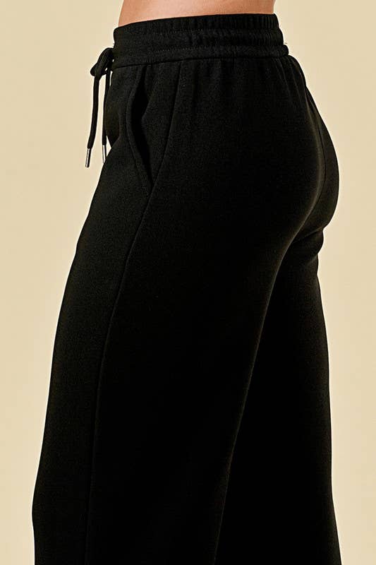 MID-RISE DRAWSTRING WIDE LEG PANTS WITH FUR LINING
